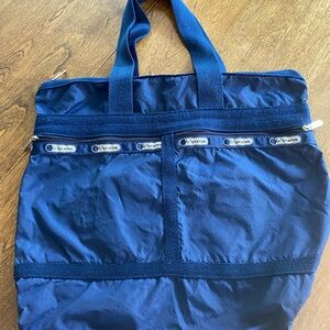LeSportsac Large Tote Bag Navy Blue Nylon
Twill Handles 17”x 15” 3 Pockets